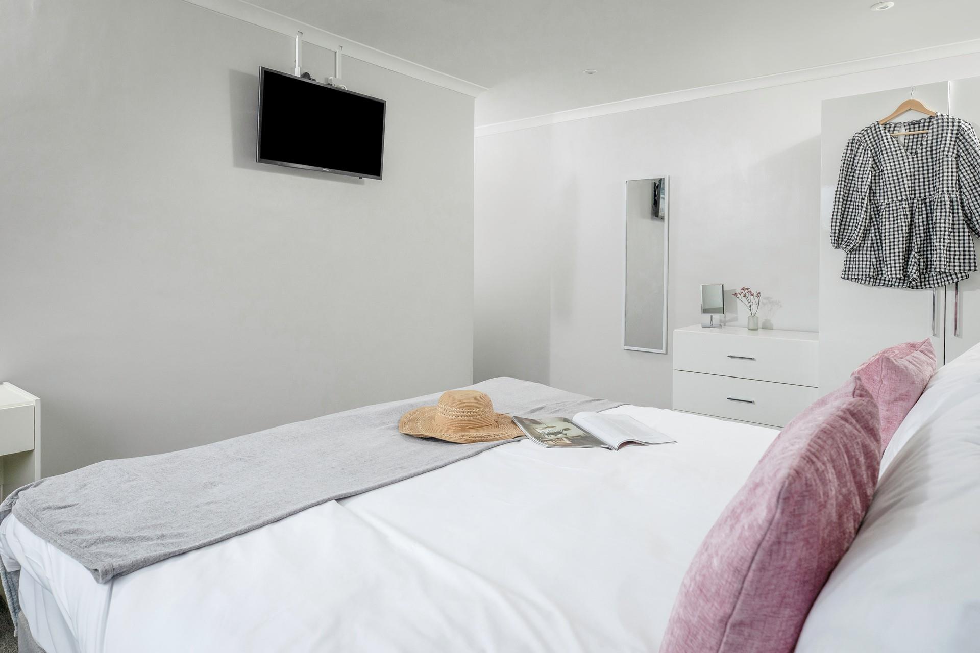 Sink into the sheets after a busy day of exploring the local coast.