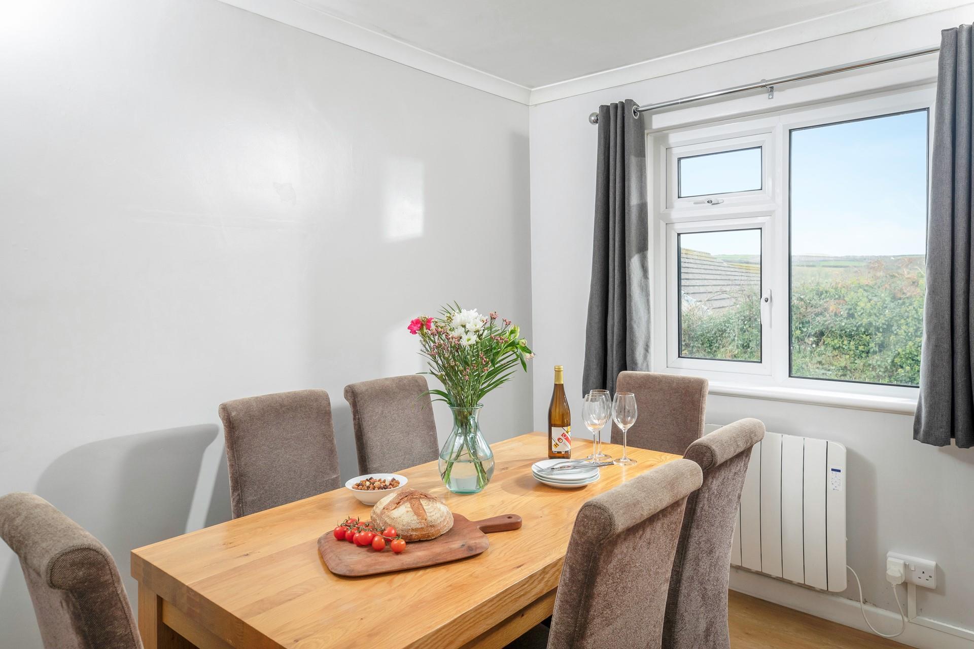 Tuck into a tasty meal with the family around you in the dining room.