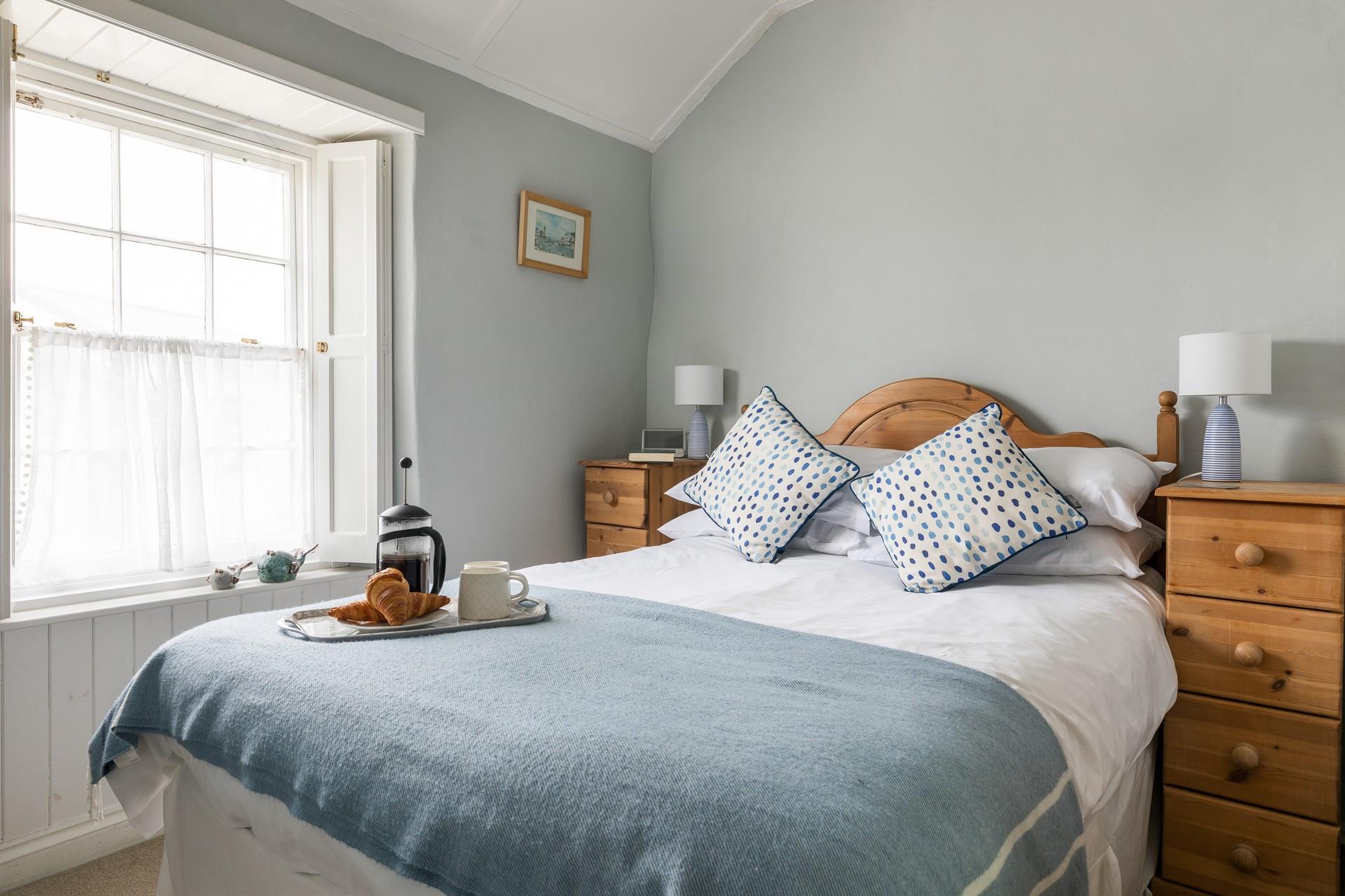 Drift off for a dreamy night's sleep in the cosy double bed.