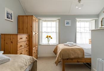 The two sash windows allow for the bedroom to be bright and airy.
