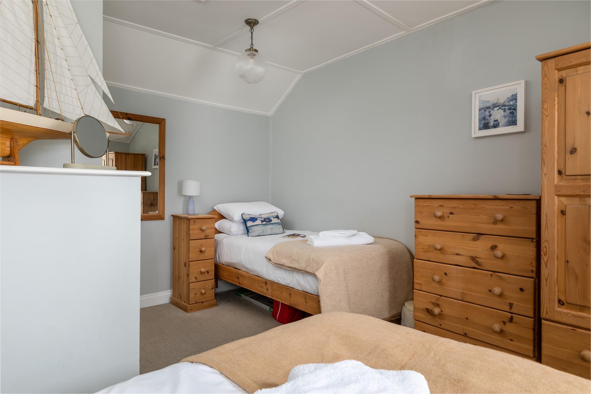 Bedroom 2 has twin beds perfect for the little ones to settle into after a long day.