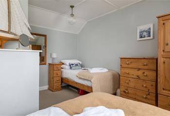 Bedroom 2 has twin beds perfect for the little ones to settle into after a long day.