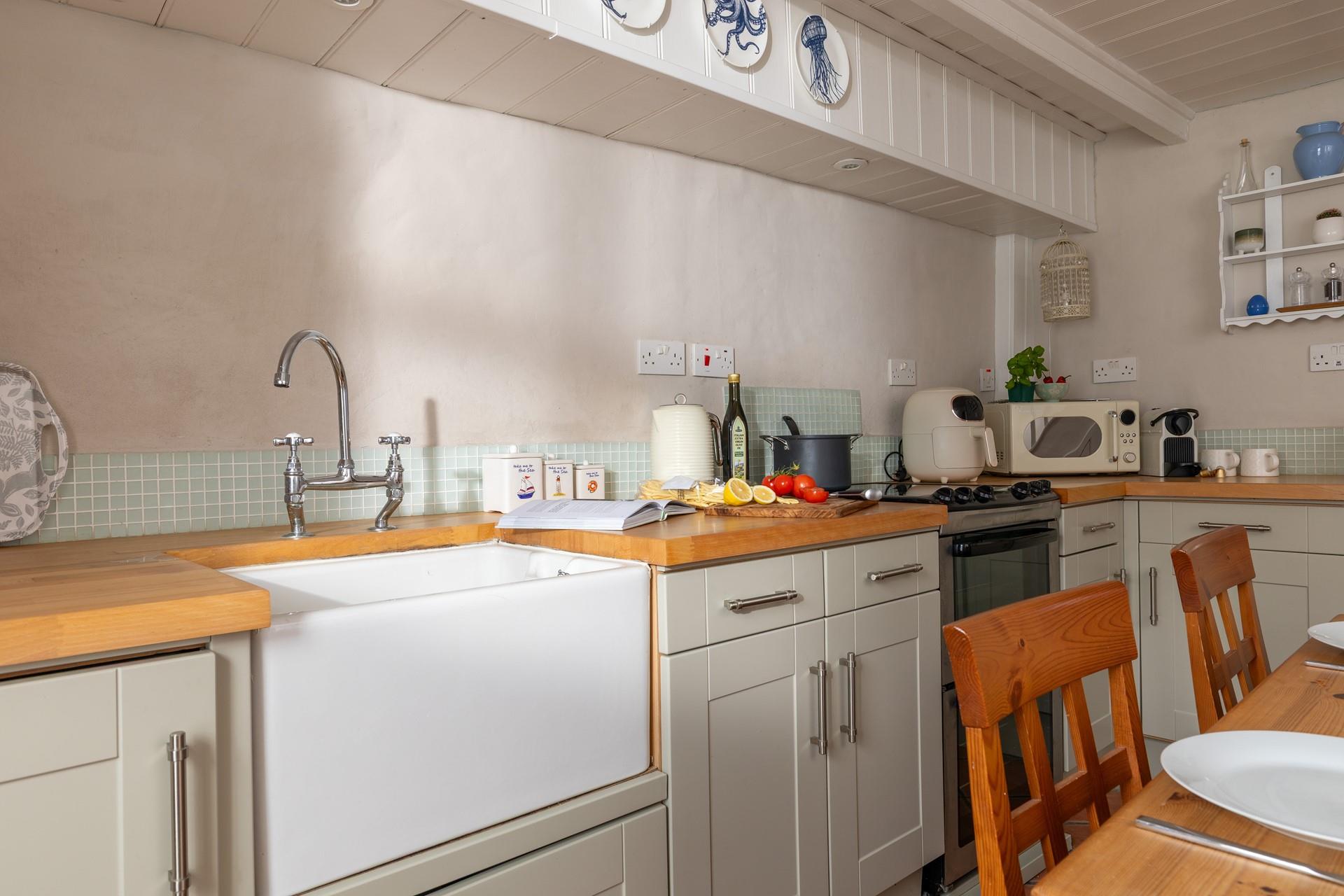 Cook up a storm in the well-equipped kitchen.