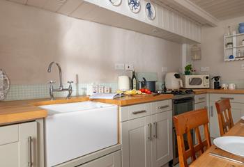 Cook up a storm in the well-equipped kitchen.