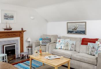 Settle into the cosy sofa with a cold drink and watch the comings and goings in the harbour.