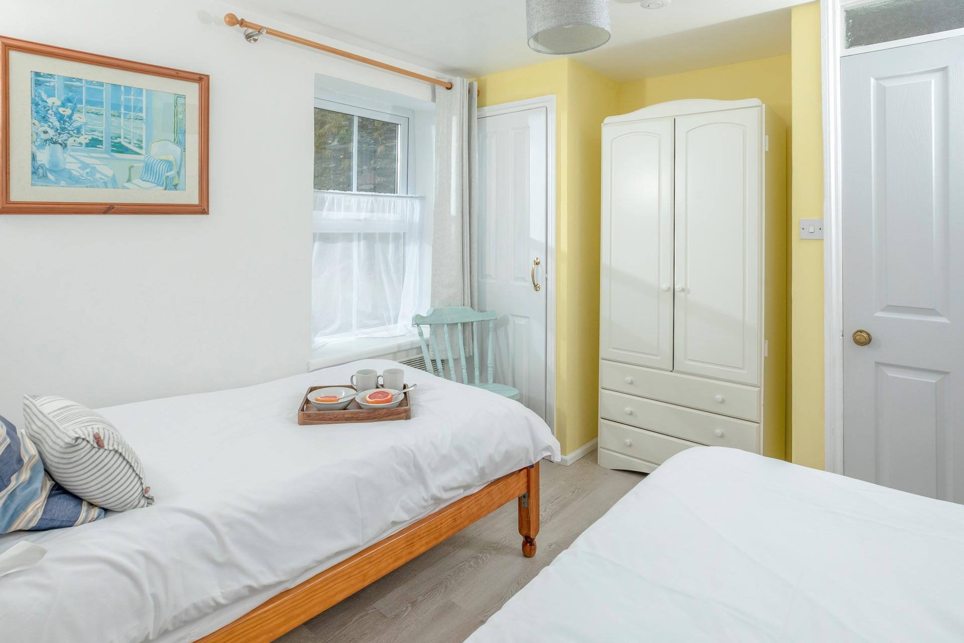 Tuck the kids into the cosy twin beds and relax in the living room.