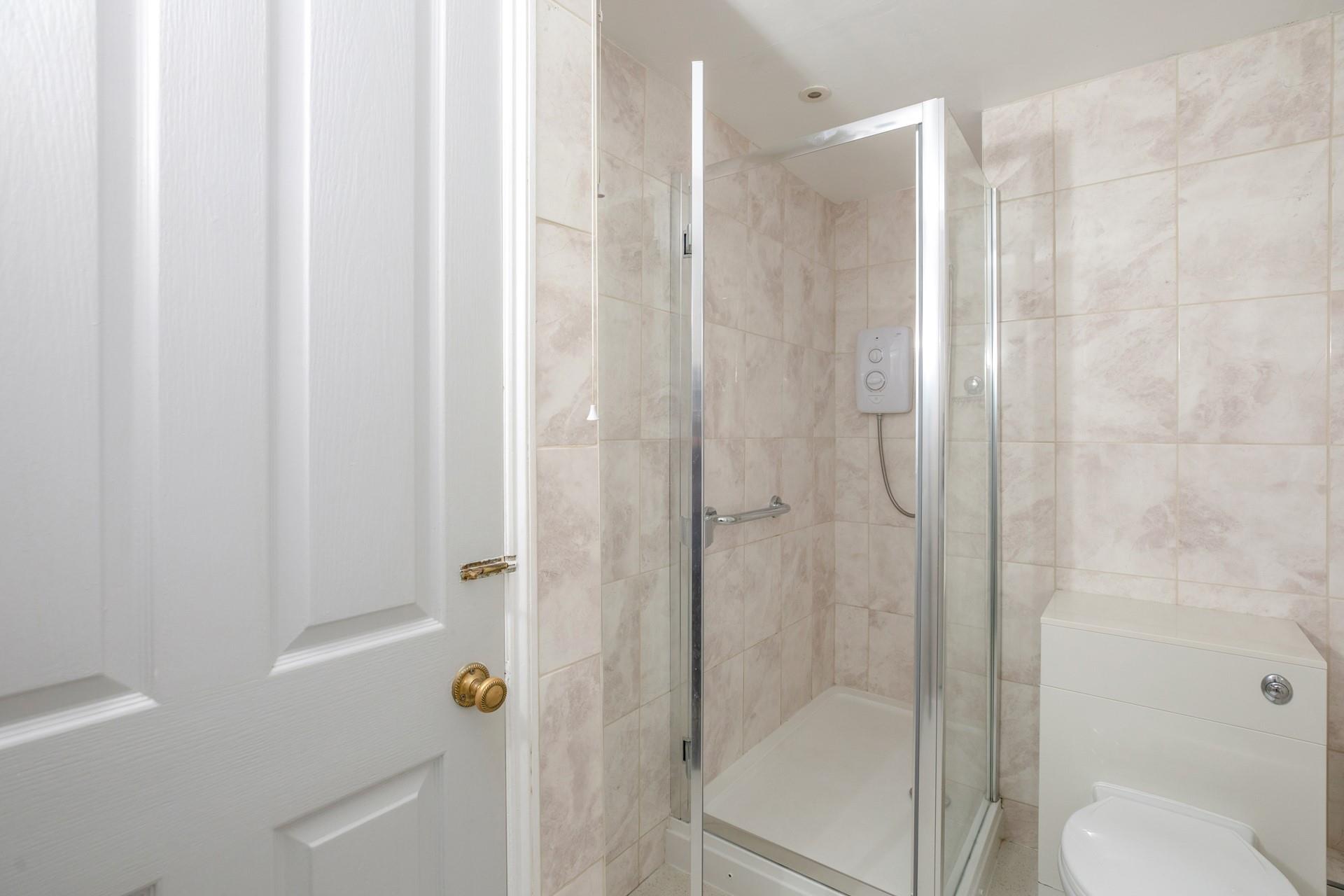 Wash off your sandy toes in the shower after a day on the beach.