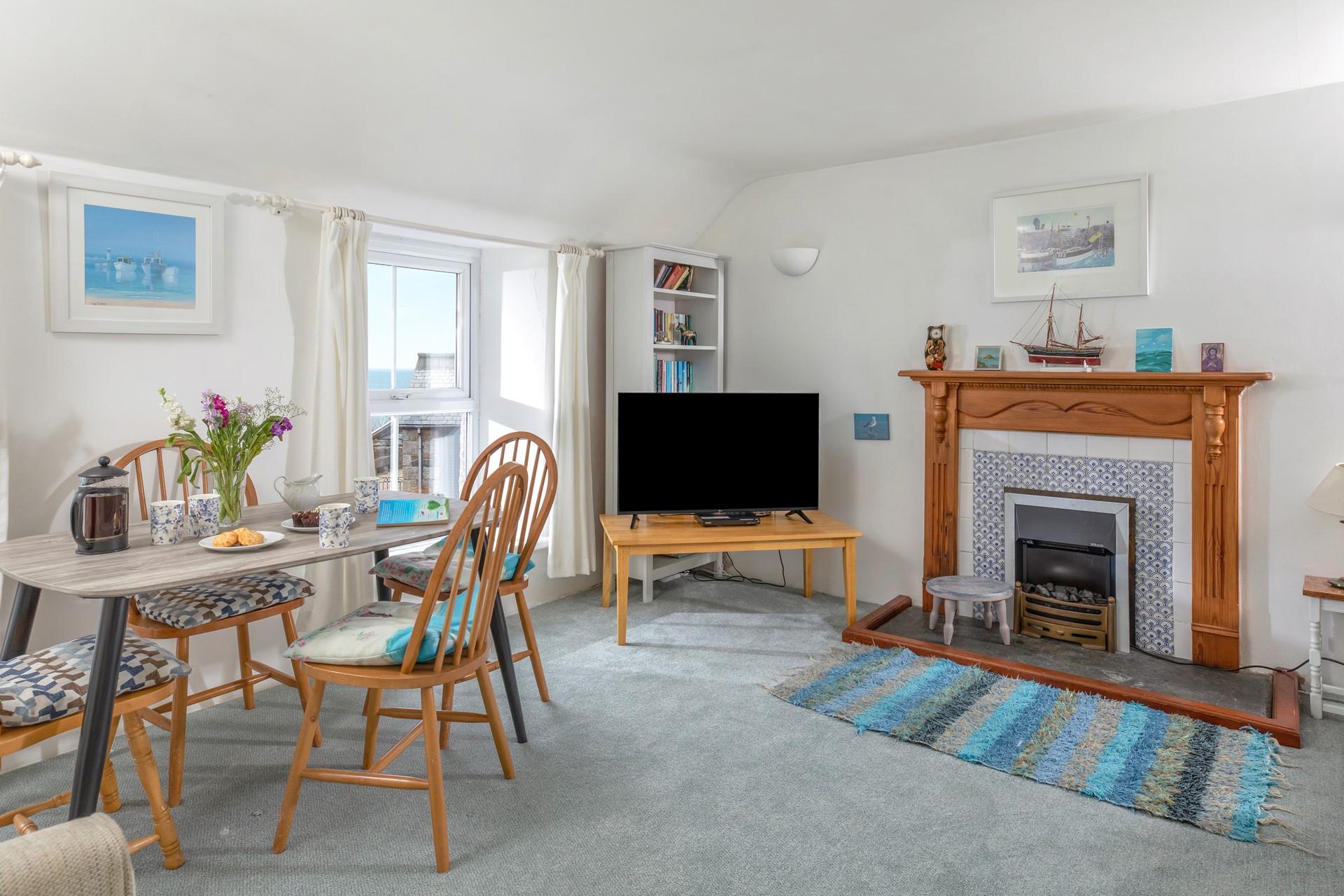 Sit around the table and tuck into a delicious cream tea after a walk around the village.