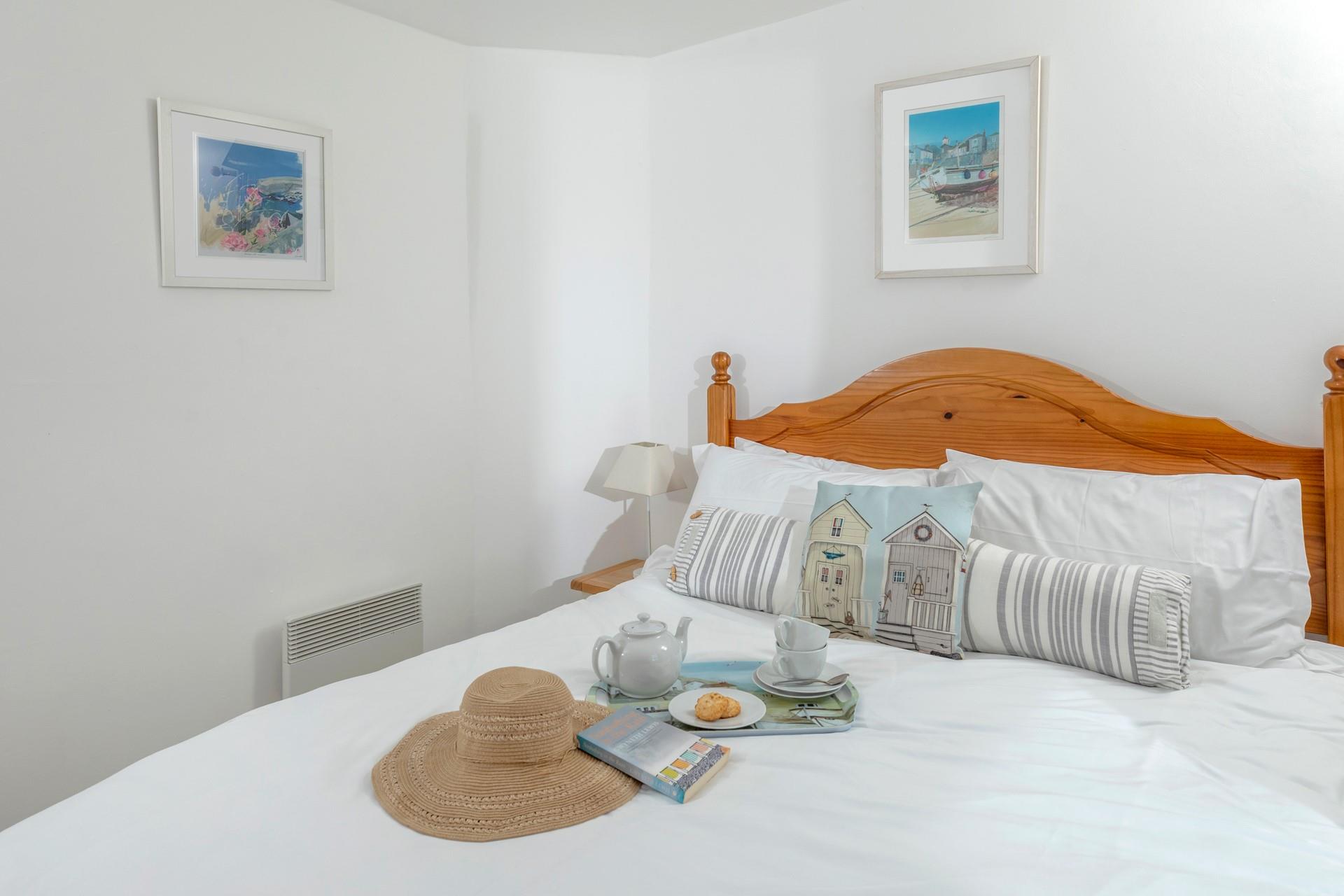 Tuck into the comfortable bed after a busy day.