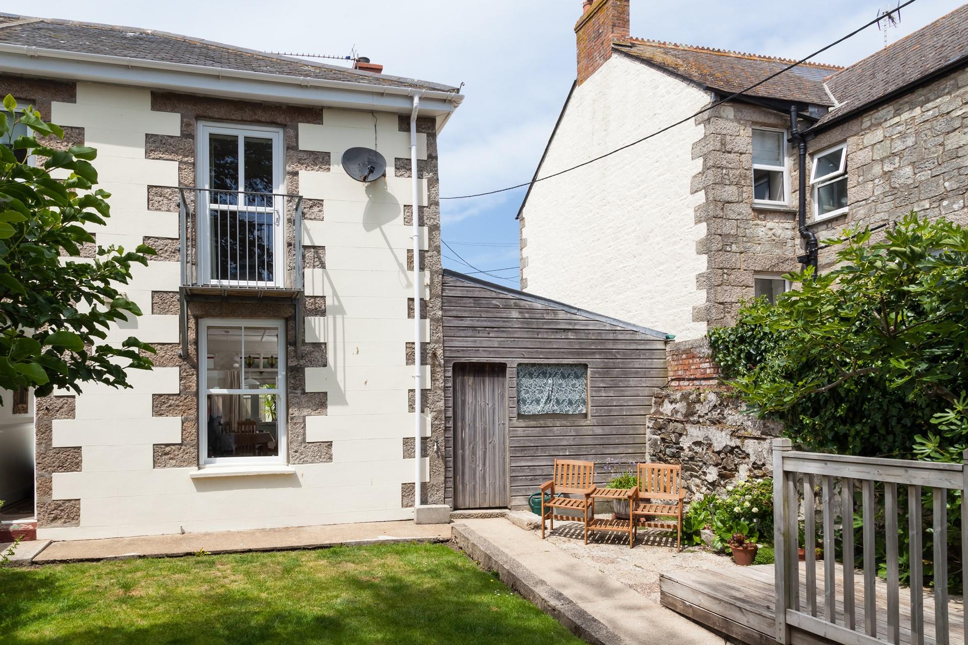 Sit outside in the garden soaking up the sun with a glass of something cold.