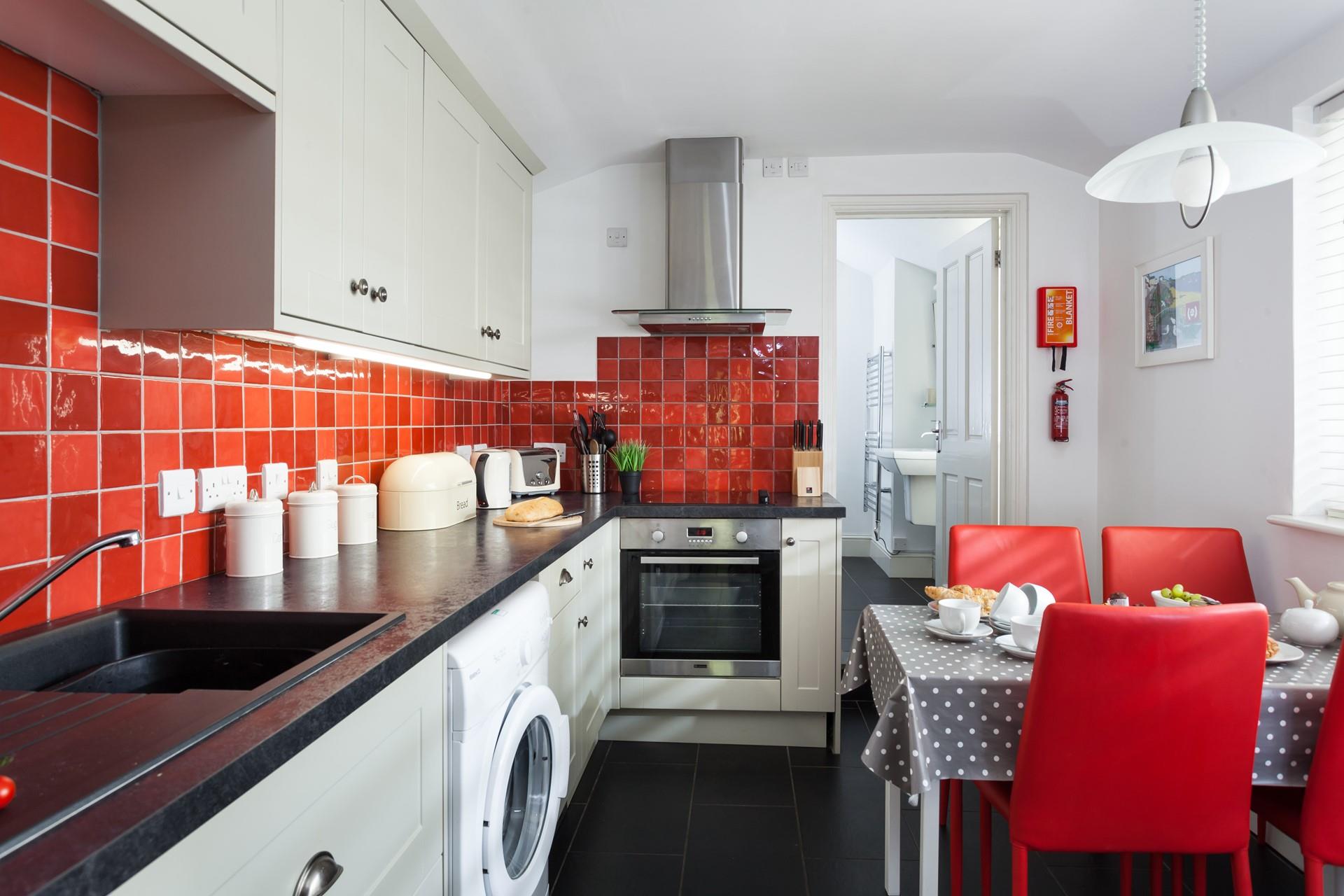 The kitchen is bright and fully equipped for all your culinary needs.