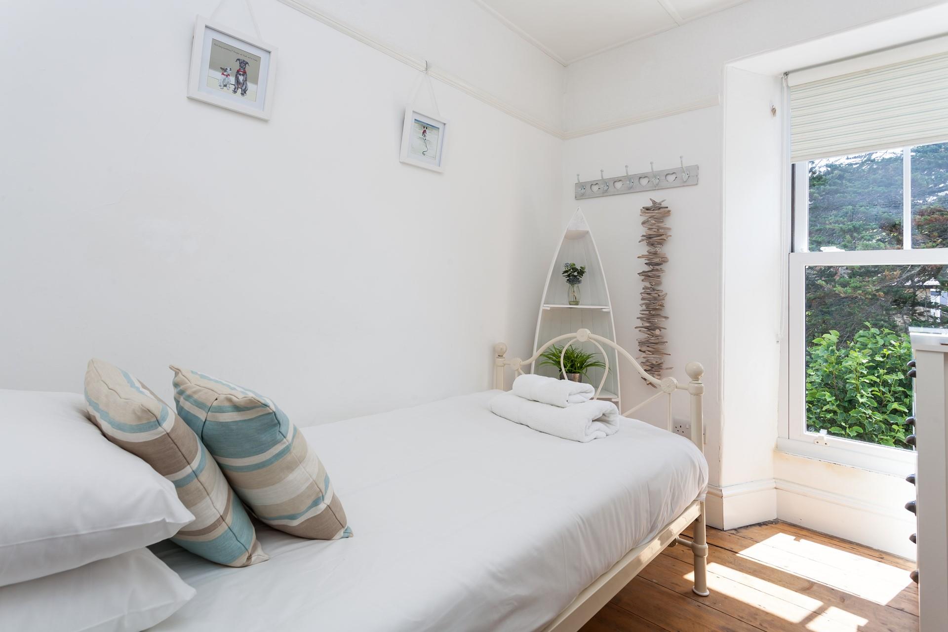 Drift off for a peaceful night's sleep after a day spent swimming in the sea and relaxing in the sand.