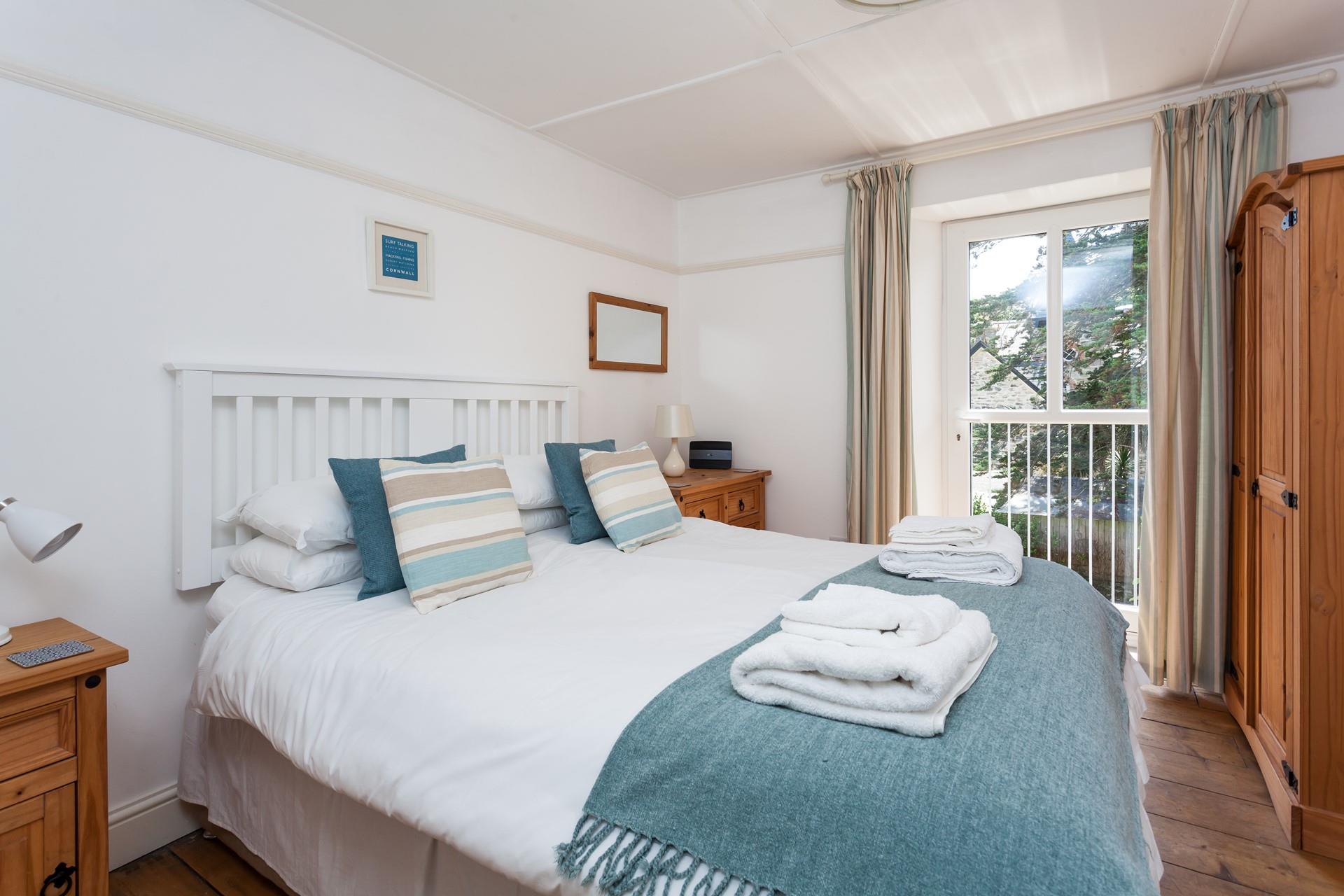 Wake up and wander to the Juliet balcony to check on the weather for the day.