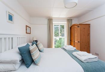 Relax in the spacious double bed after spending the day walking the coast path and exploring Praa Sands.
