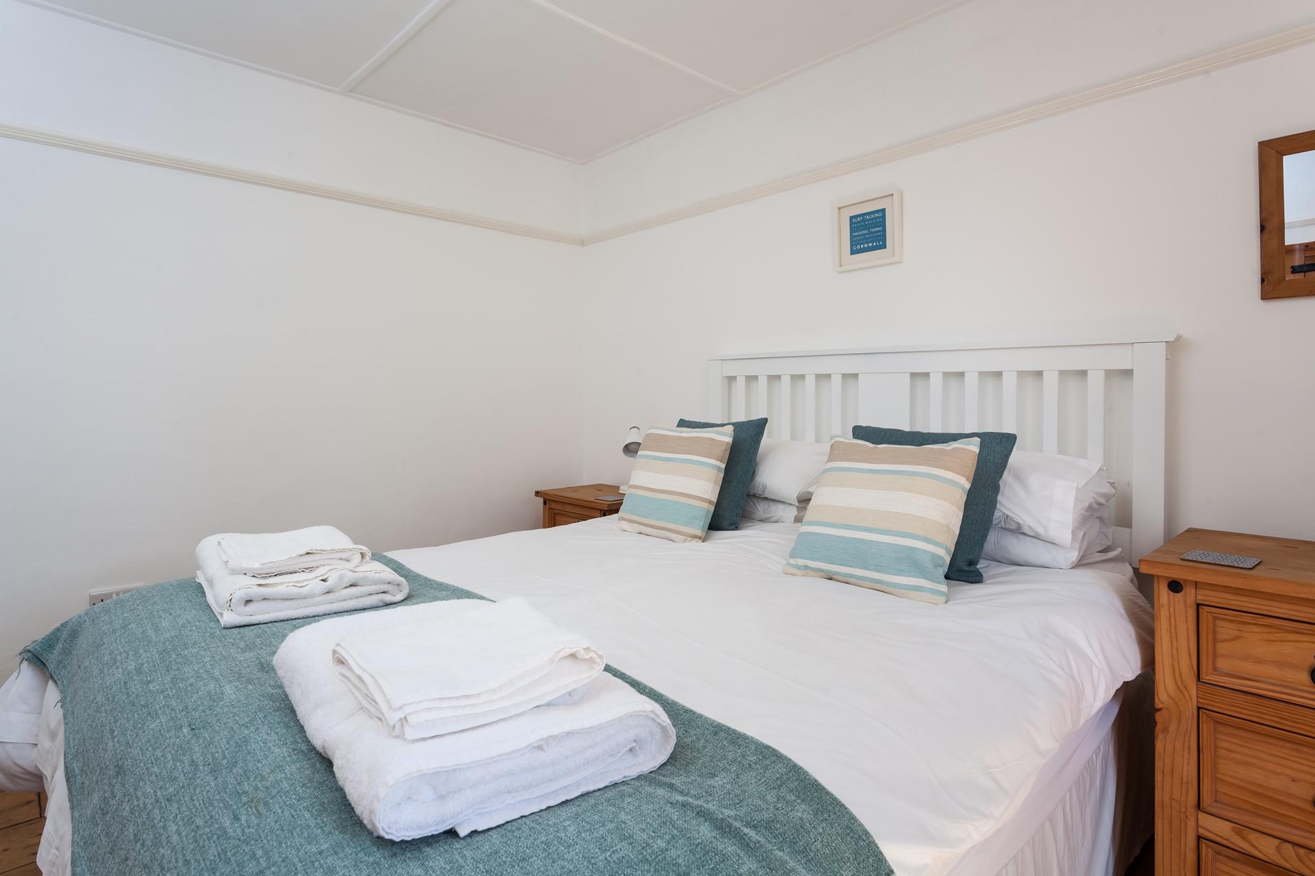 Blue tones create a calming bedroom to drift off in.