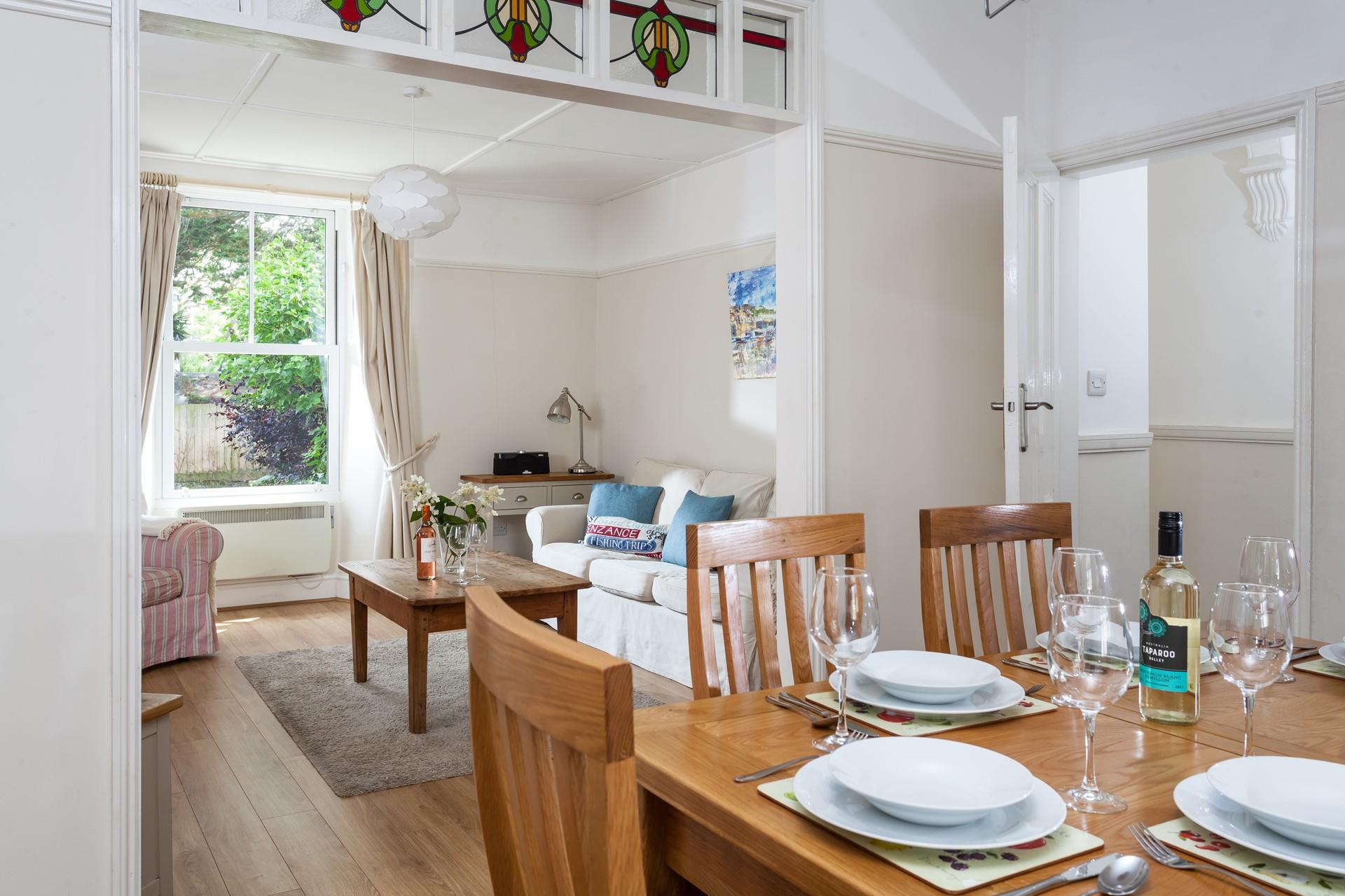 We love the original stained glass panelling in the sitting/dining room!