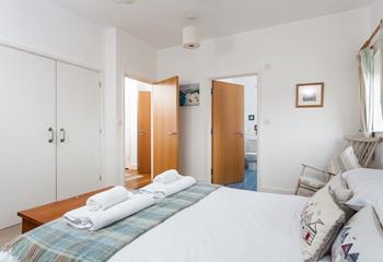 Wake up and wander into the spacious en suite to get ready for the day.