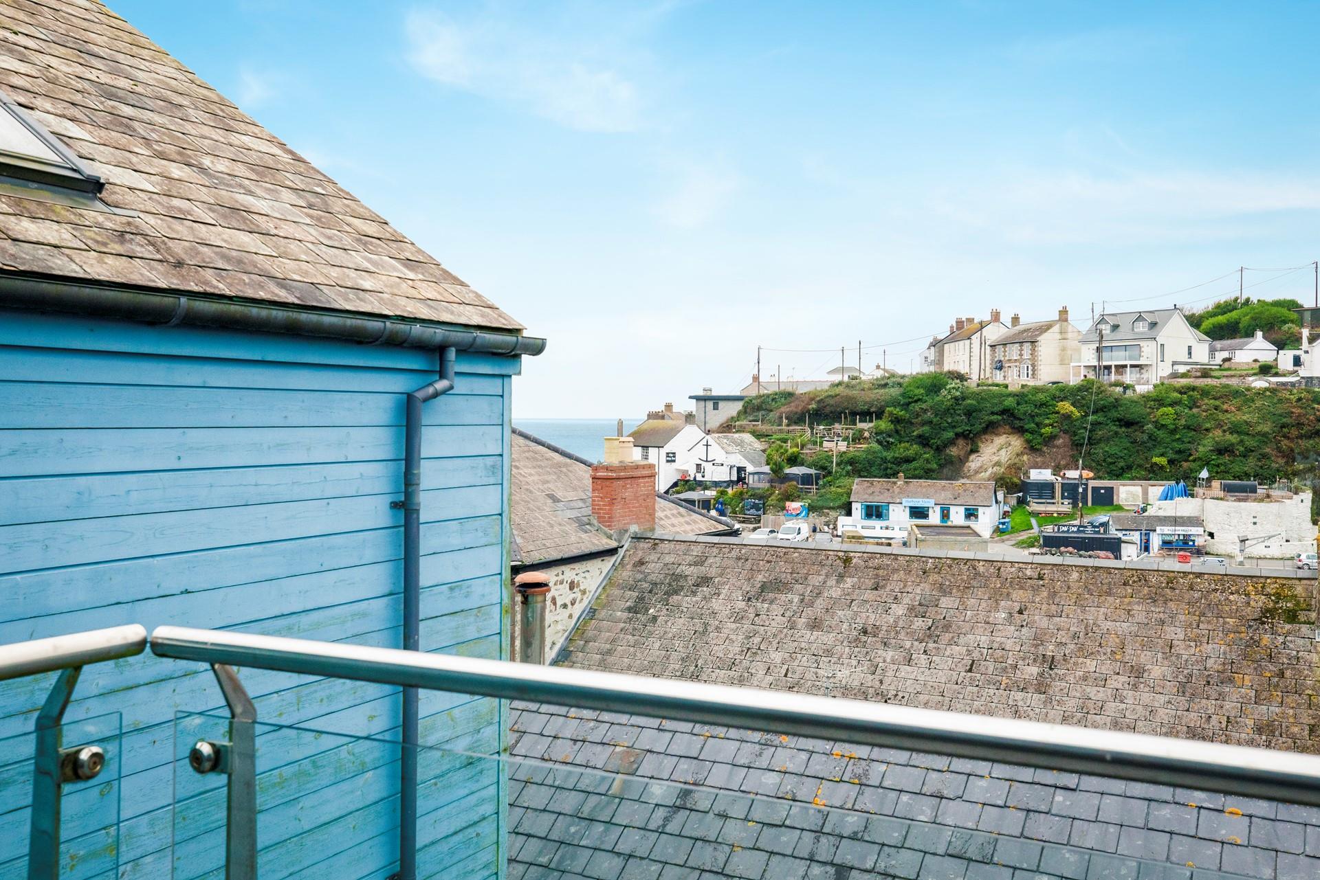 Enjoy the sea views over the quirky rooftops.