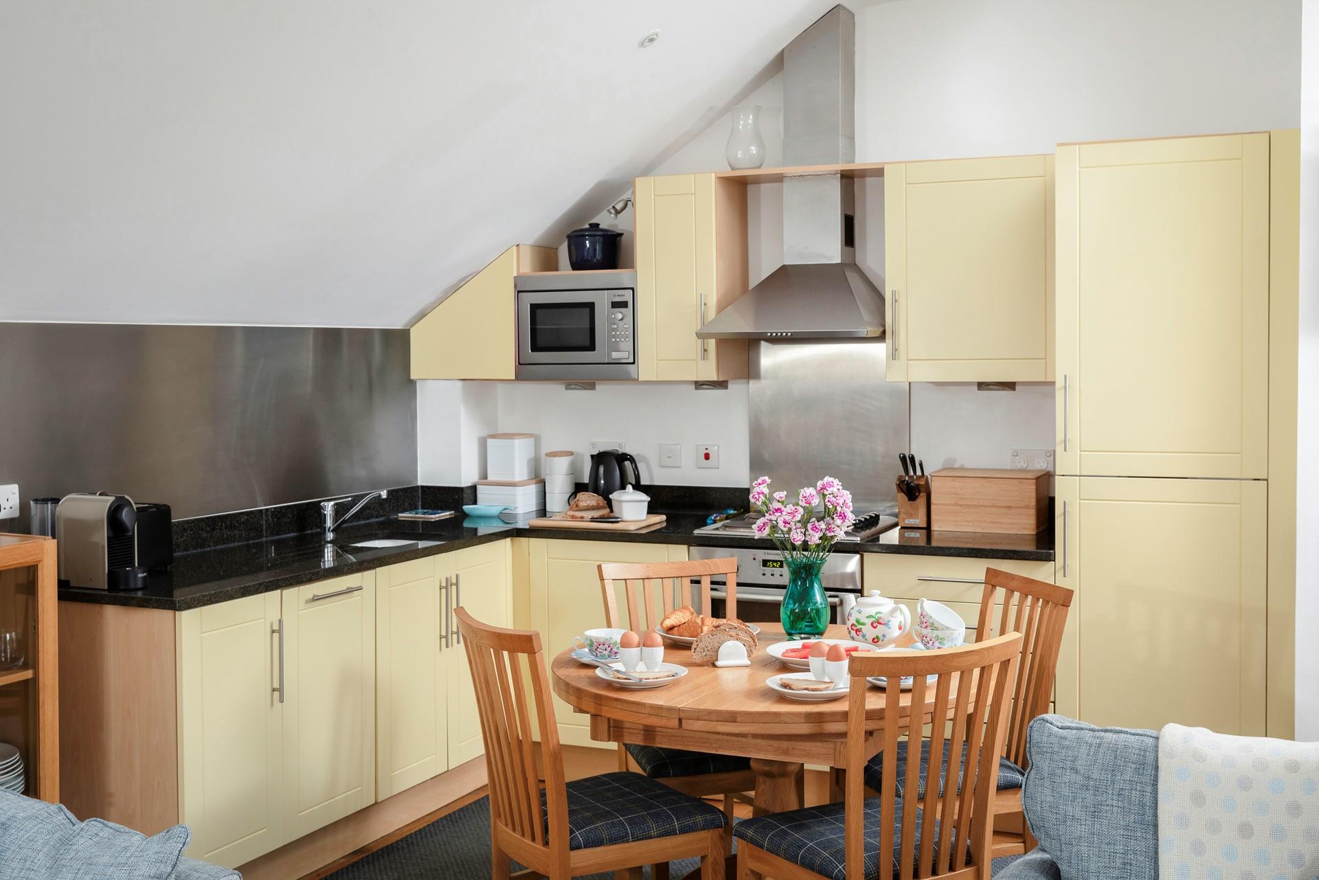 The kitchen is modern and fully equipped for cooking up a storm.