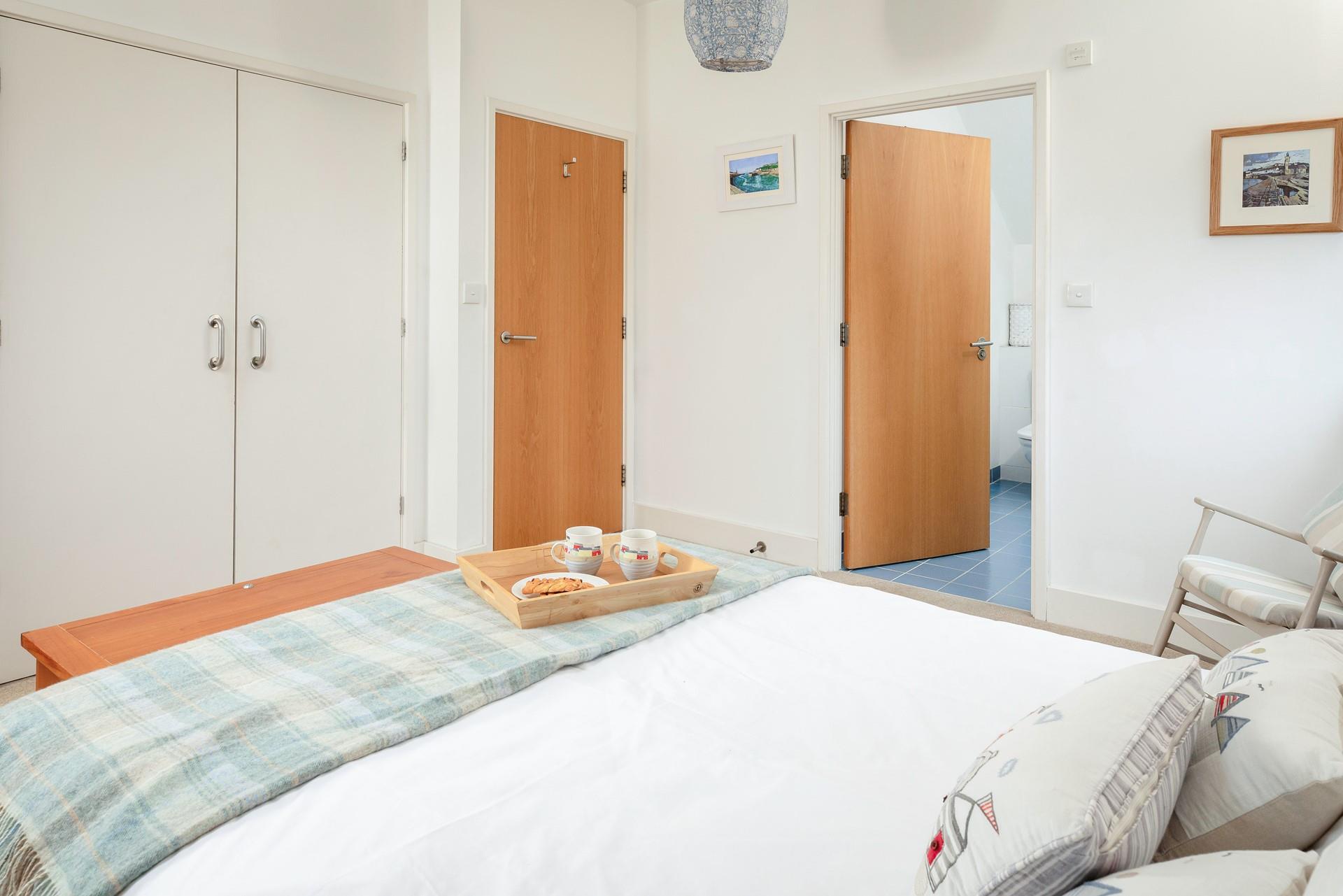 Wake up and wander into the spacious en suite to get ready for the day.