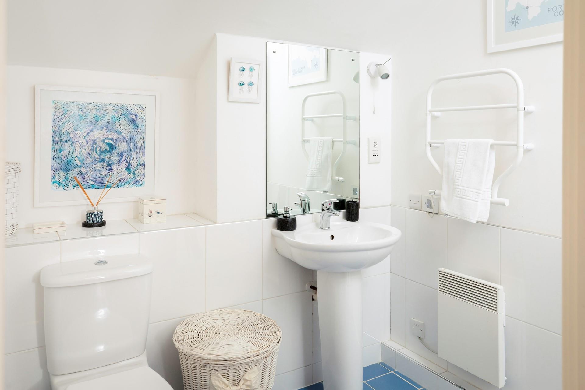 Wash off sandy toes in the shower after a day on the beach.