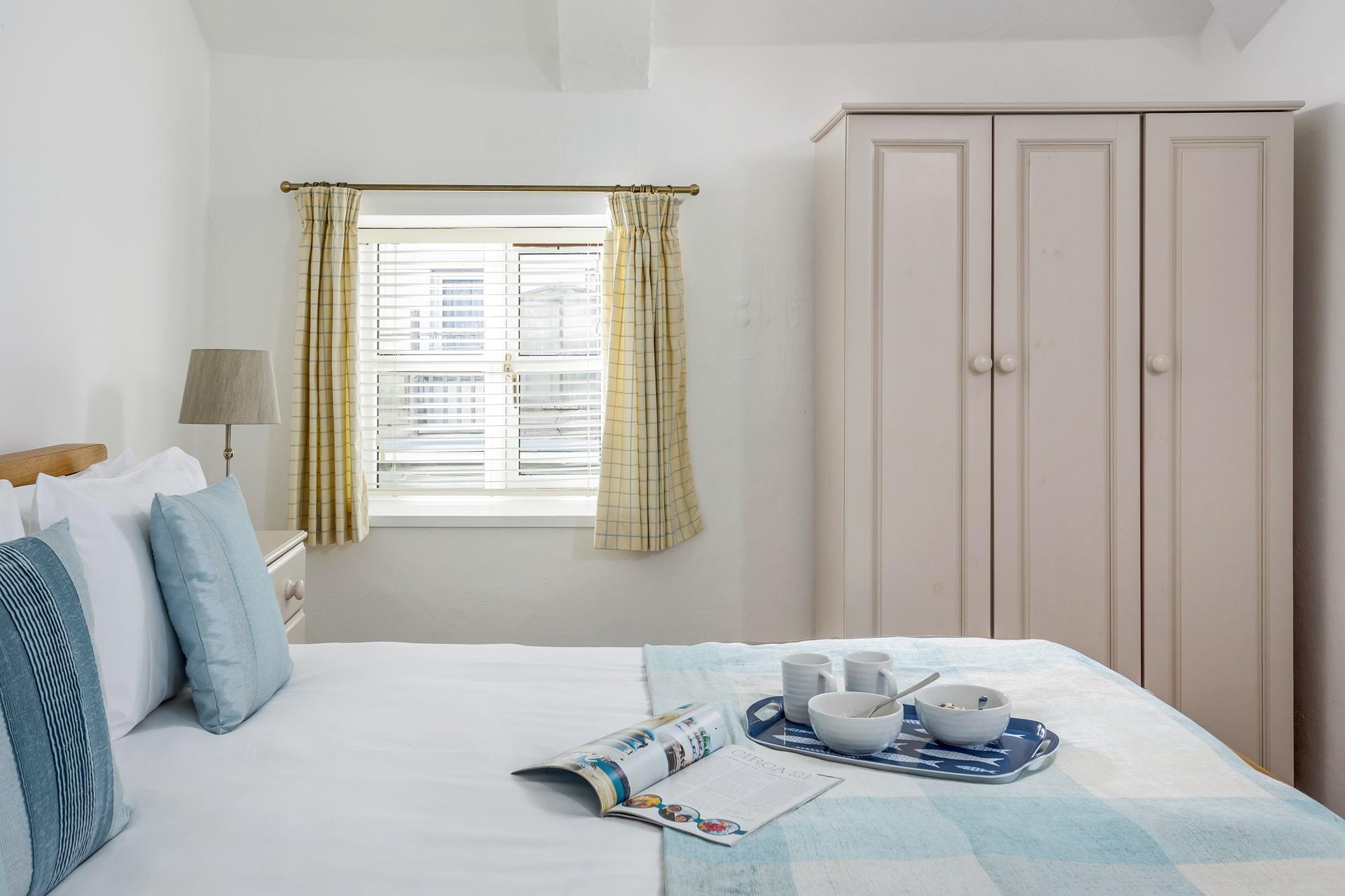 Bedroom 1 has a spacious king size bed offering a dreamy night's sleep.