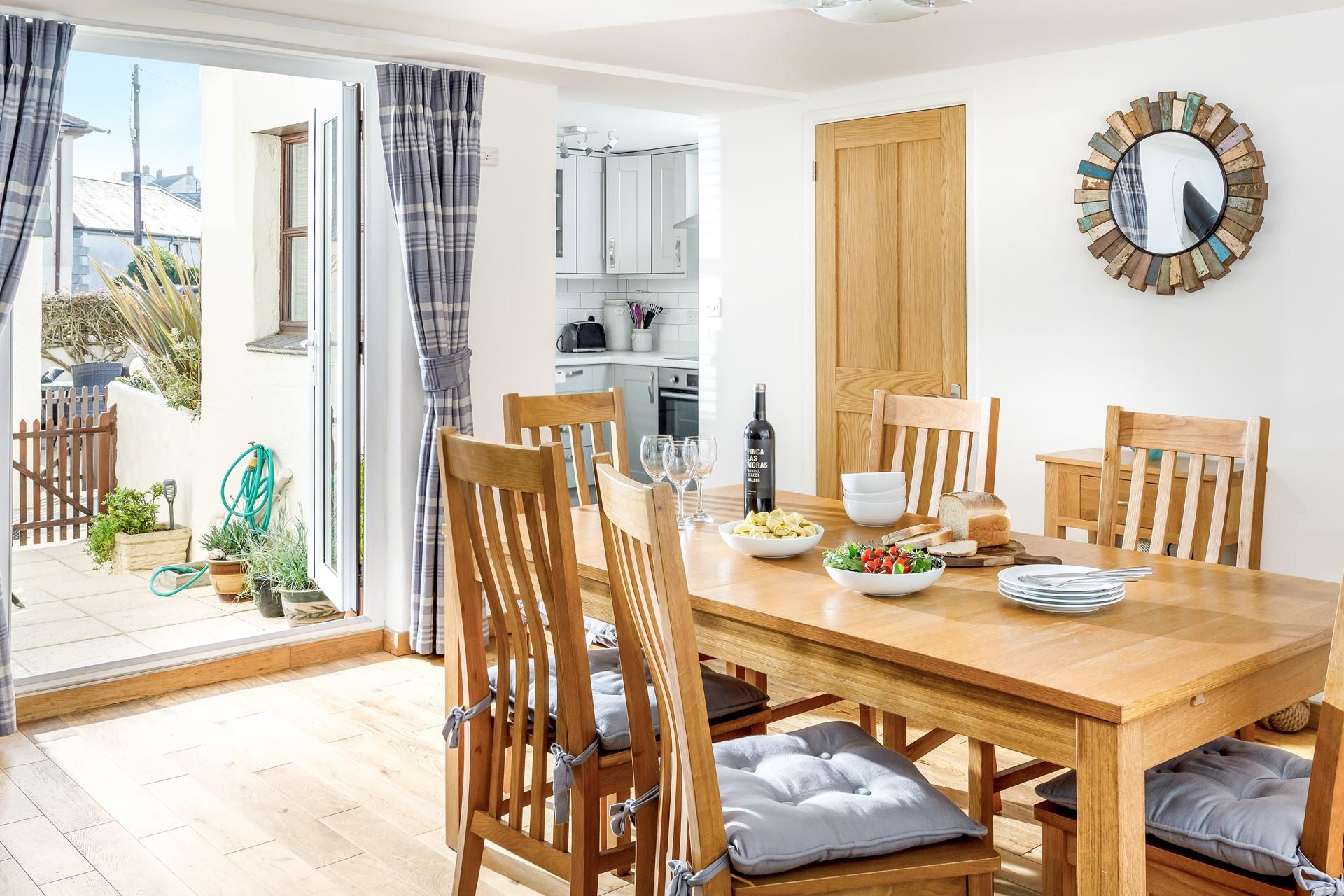 Sit around the dining table and tuck into a tasty feast.