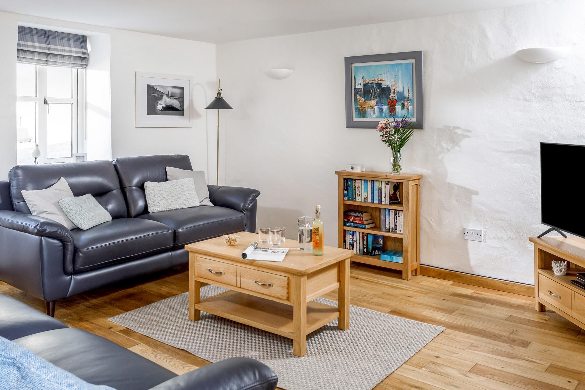 The sitting room is a cosy space to have a family movie night with snacks and your favourite beverage.