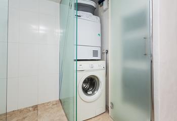 There is a tumble dryer and washing machine available for use in the property.