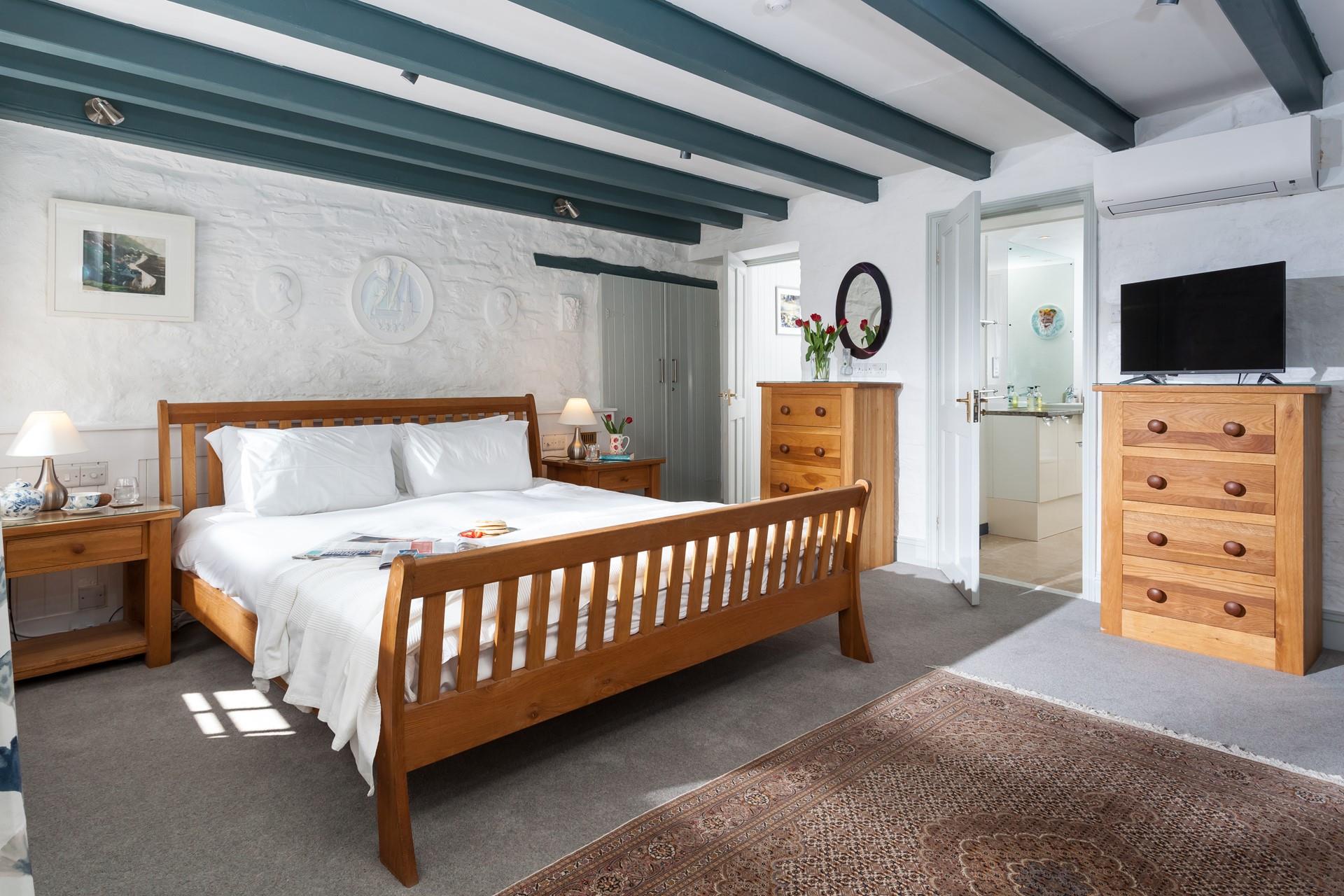 The sumptuous super king size bed offers guests a peaceful night's sleep.