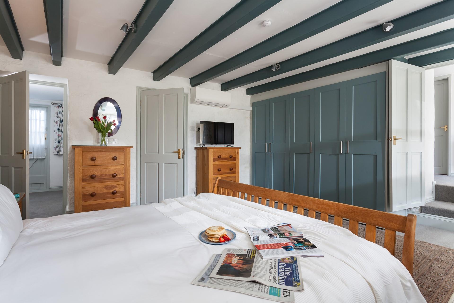 Start the day with fresh pancakes in bed and discuss the day's plans.