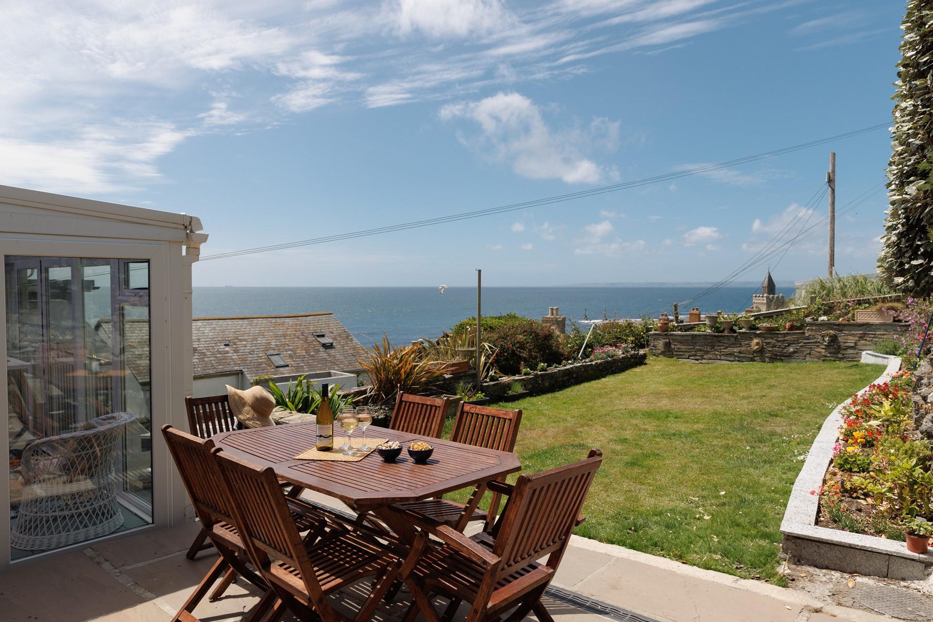 Sip a glass of something cold and enjoy the sea view.