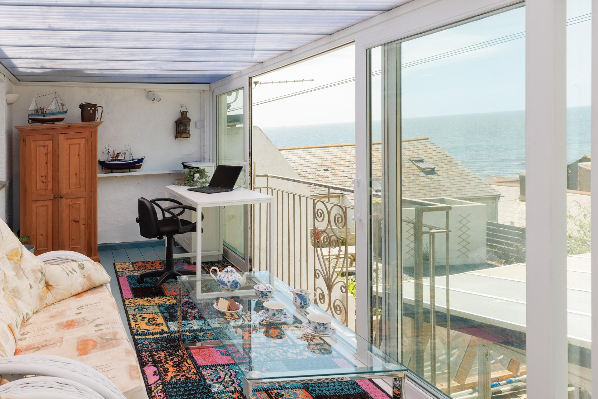 Enjoy the view from the sunroom.