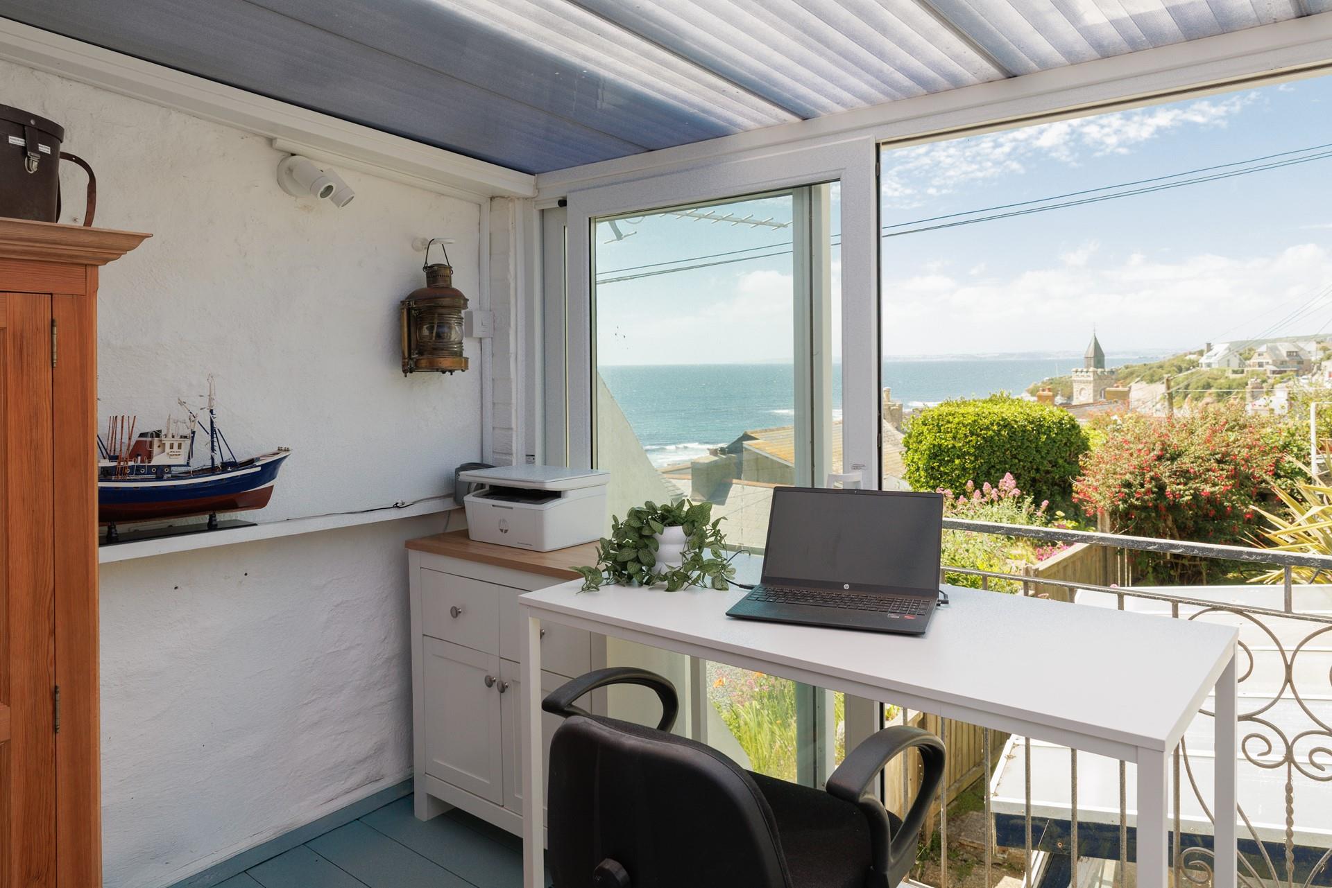 Catch up on emails at the handy desk area.