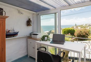 Catch up on emails at the handy desk area.