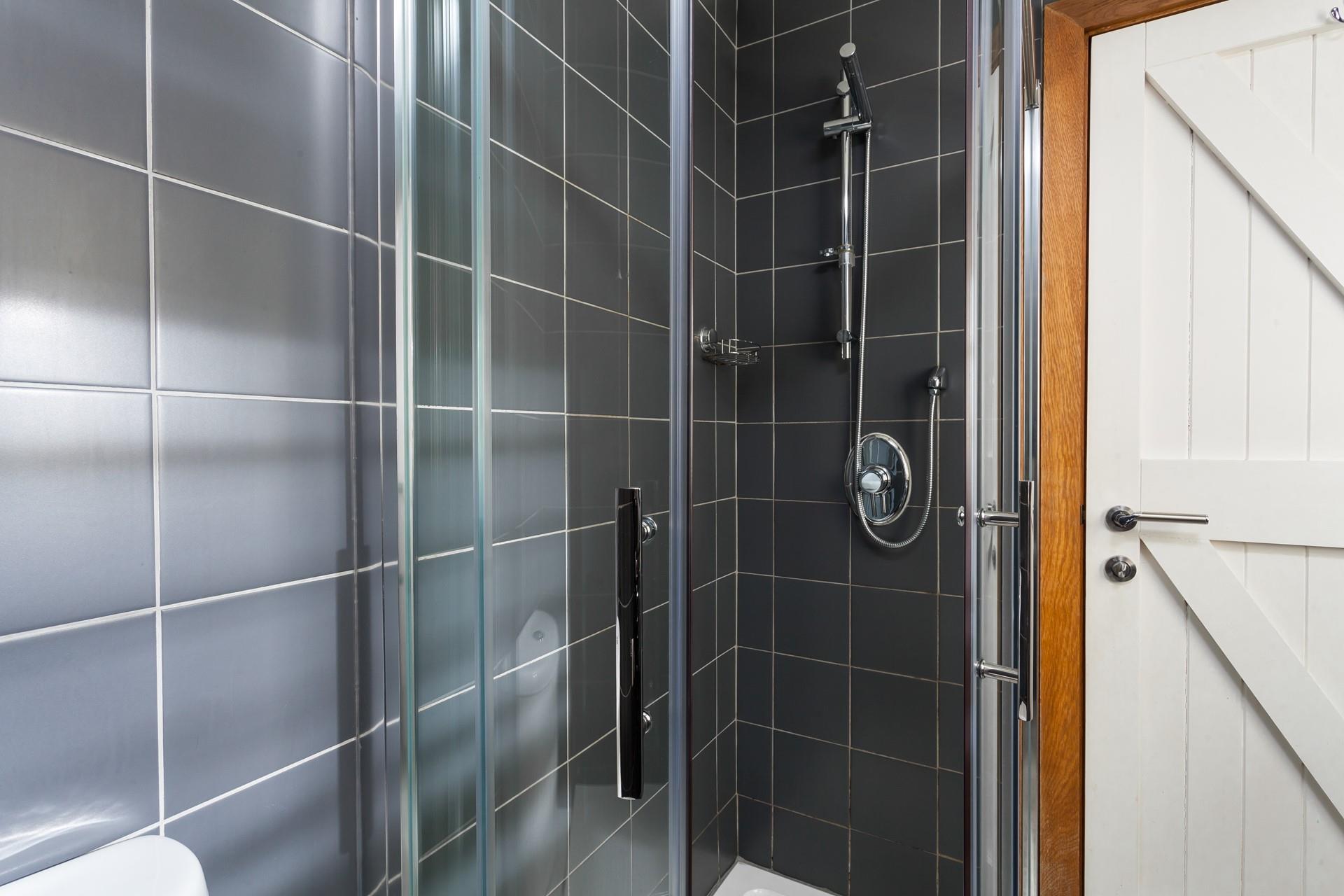 Wash off your sandy toes in the shower after a day spent on the beach.