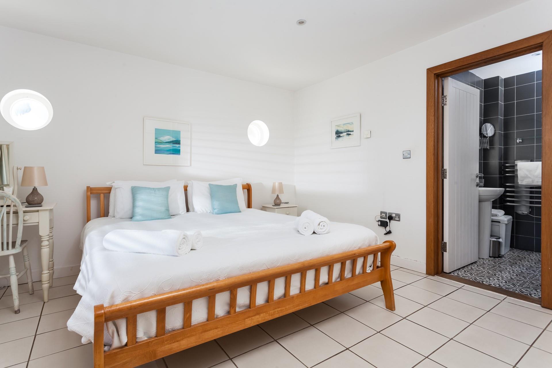 Bedroom 1 has a luxurious super king size bed and an en suite.