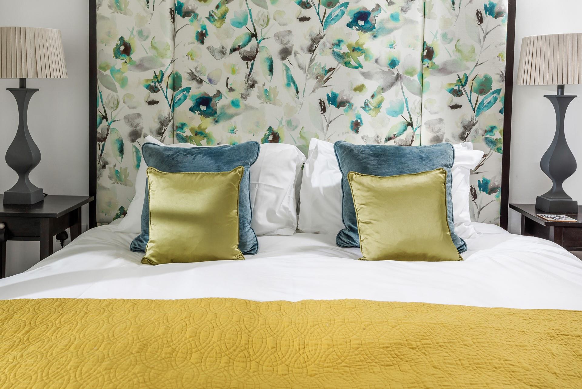 Sink into the soft sheets of the king size bed and drift off for a dreamy night's sleep.