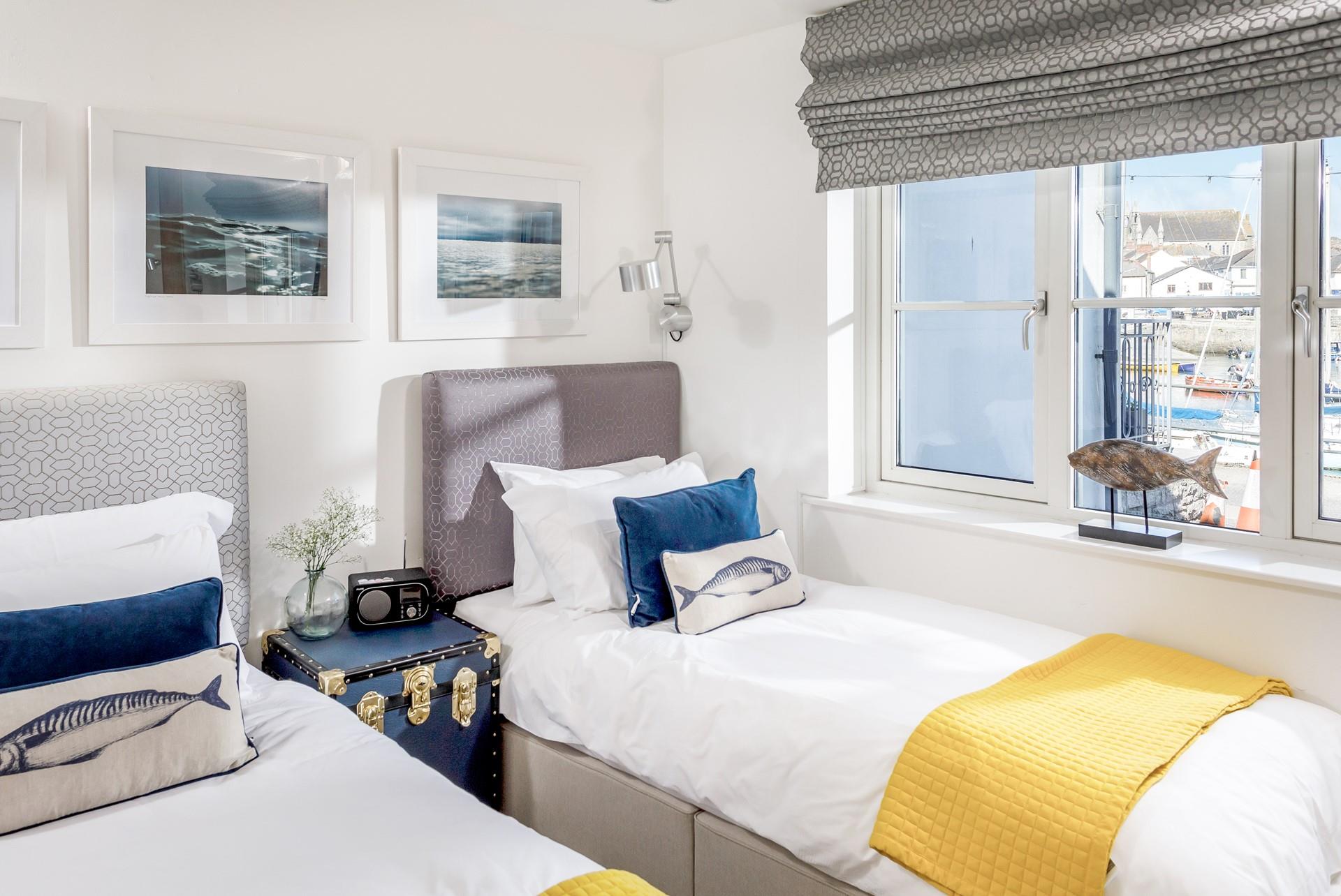 The zip and link beds allow for flexible sleeping arrangements in homely bedroom 2.