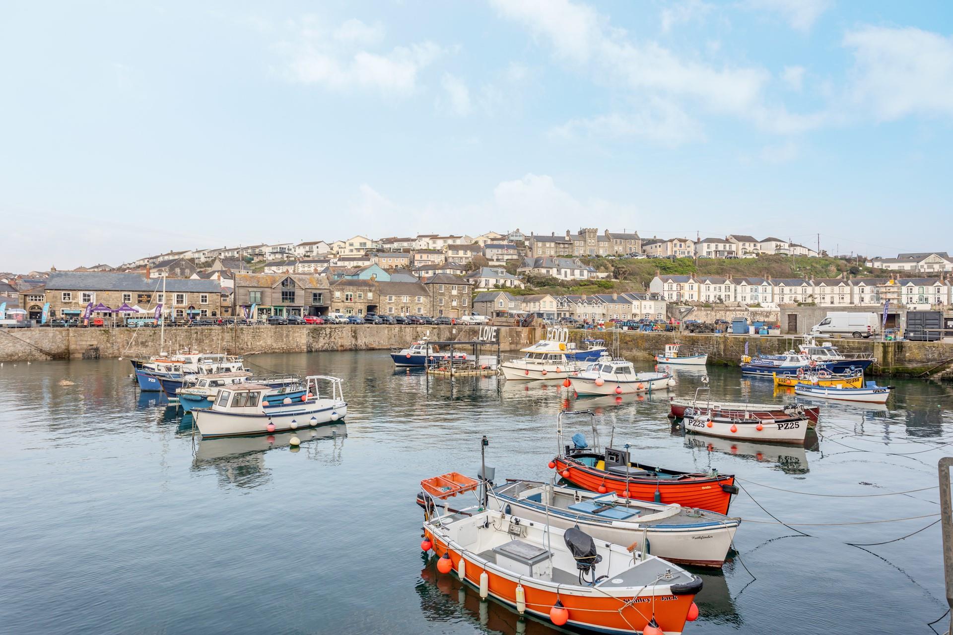 Enjoy views of the harbour from the sitting room window.