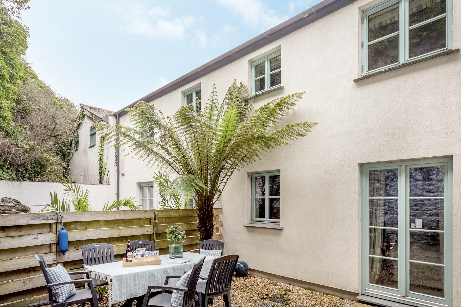 Come back after a day on the beach to light a barbecue.