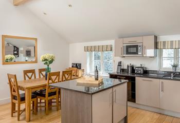 The kitchen is modern and sleek and great for cooking tasty meals.