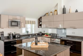 There is ample worktop space for preparing meals, a dream for the chef of the family!