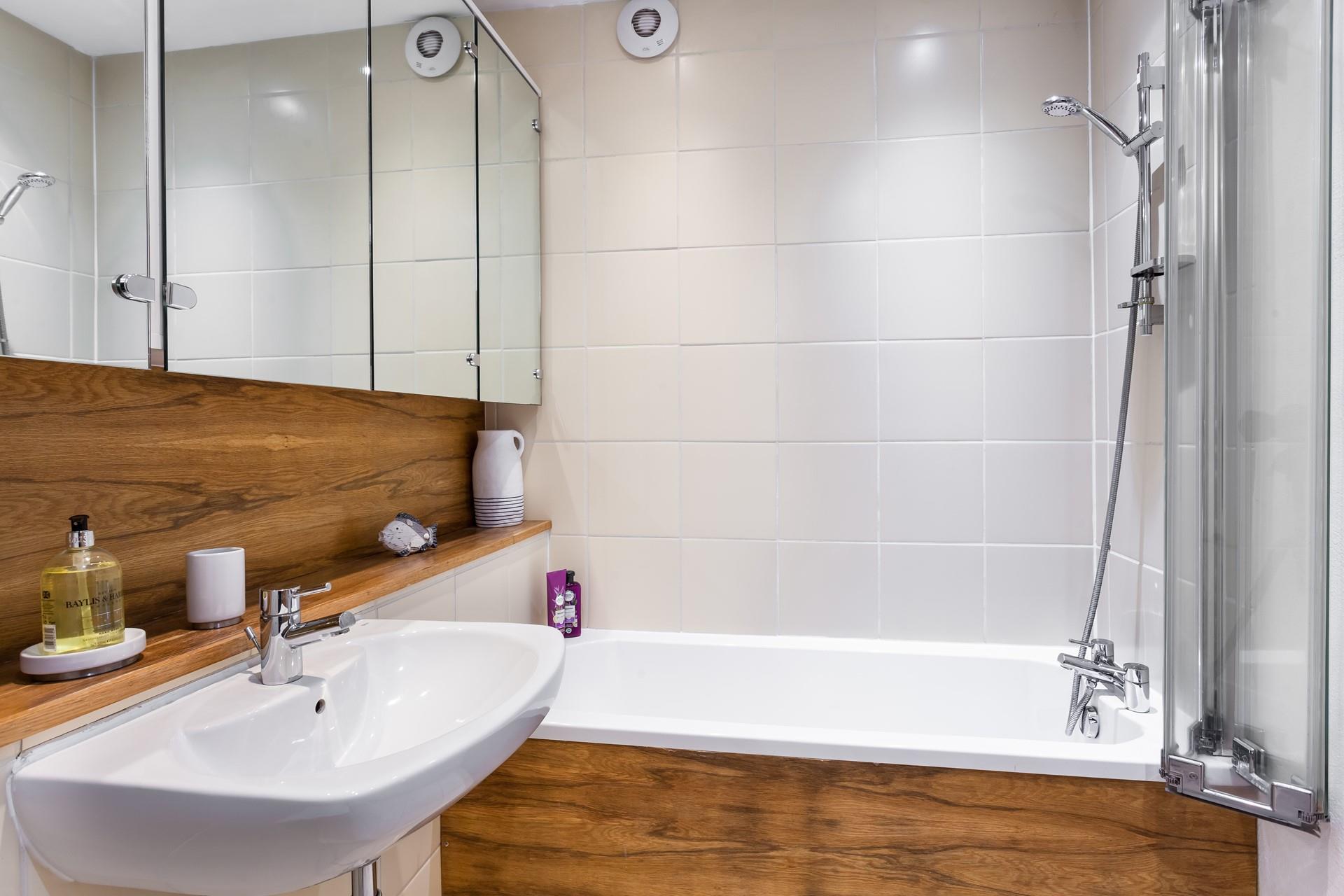 Start the day with an invigorating morning shower before heading to the beach.