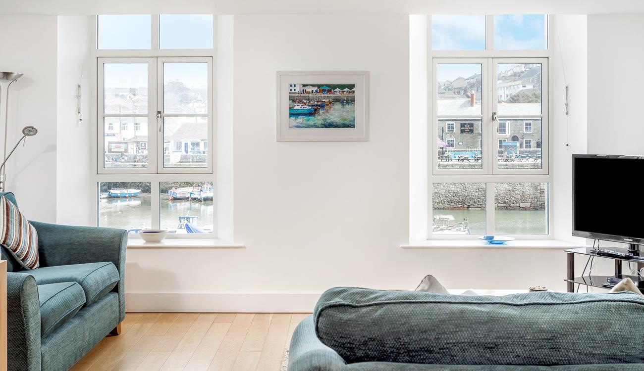 The comfortable sofas are positioned to make the most of the wonderful views across the harbour.