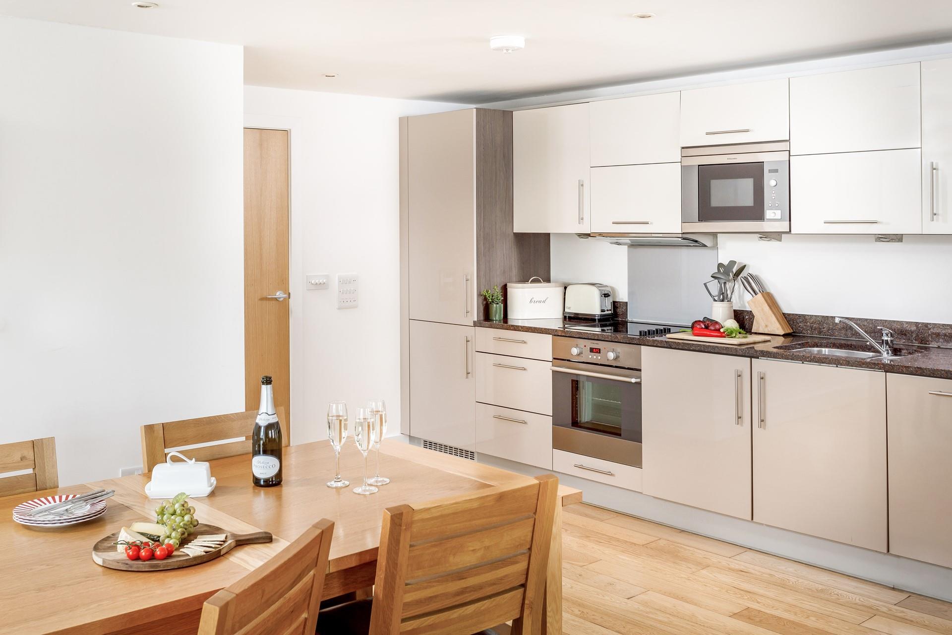 The living space is open plan, perfect for socialising with family or friends.