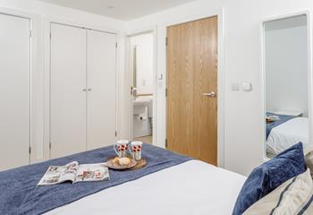 Bedroom 1 has a spacious king size bed and en suite with a shower.