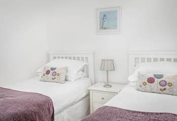 Bedroom 2 has cosy twin beds perfect for adults or children.