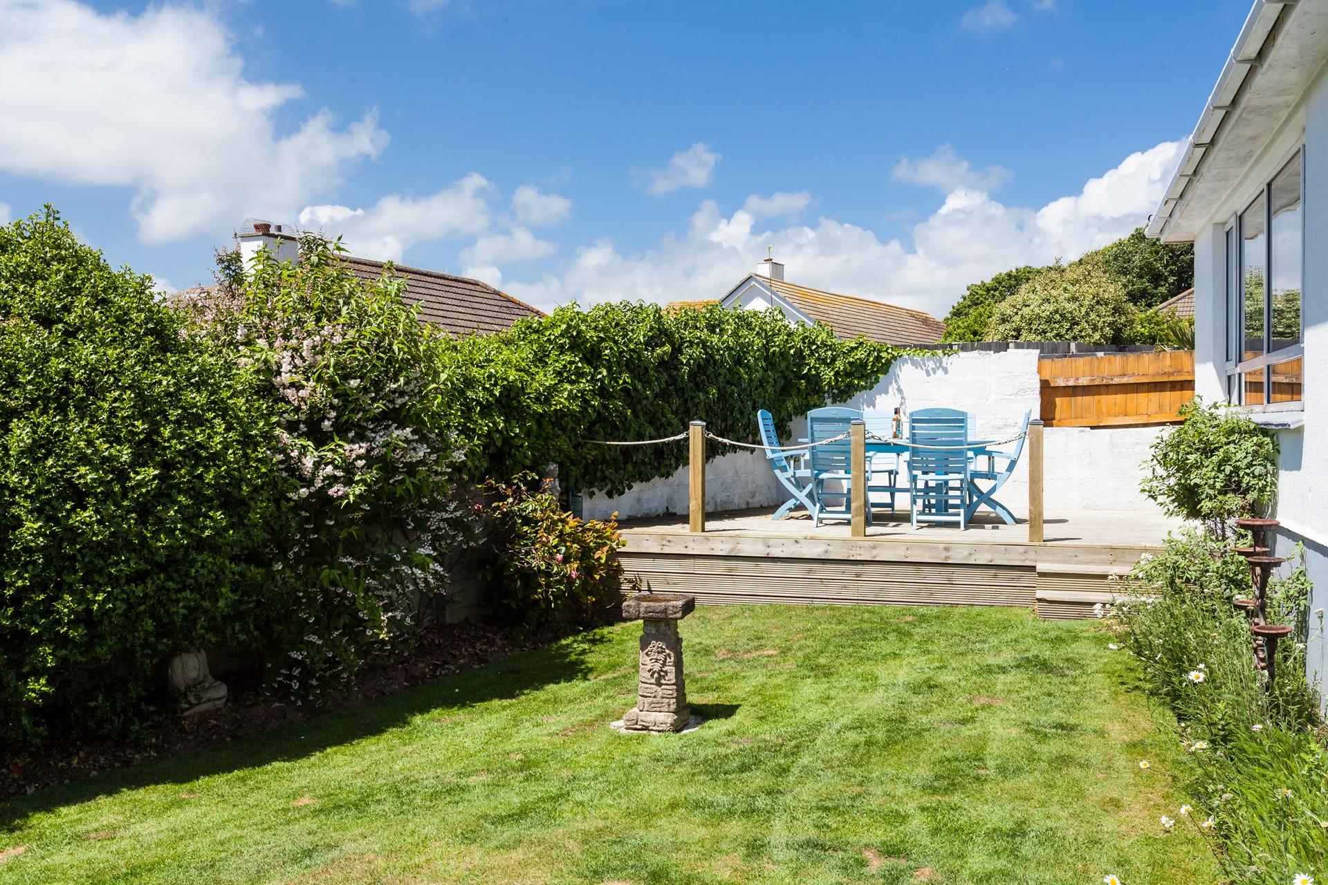 Watch the children play in the enclosed garden whilst you sip a glass of something cold.