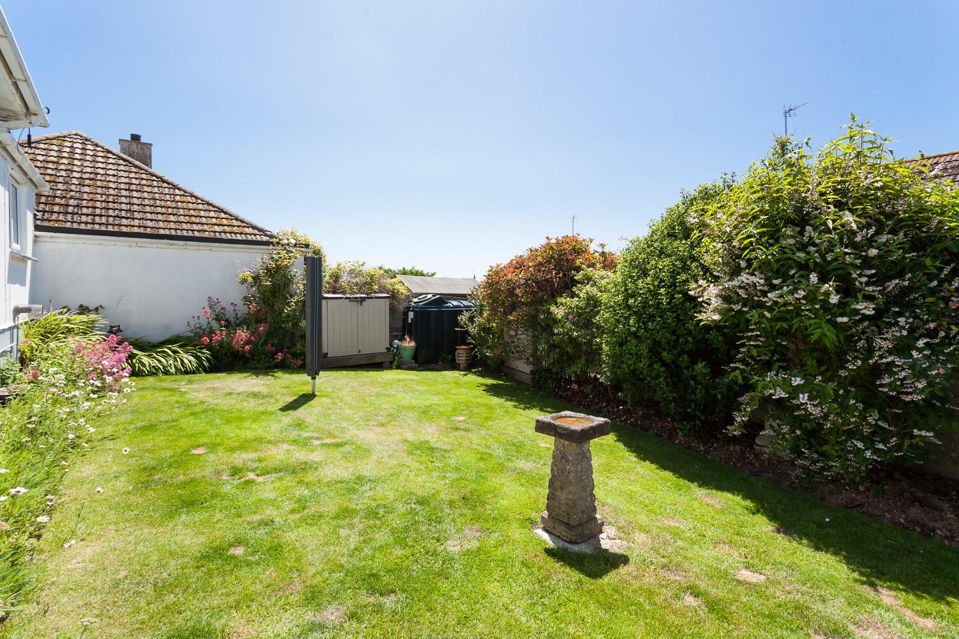 The garden is a lovely space to enjoy the sunshine on warm days.